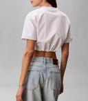 T-shirt Crop Donna Calvin Klein Bianca con laccetto  e Logo CK
