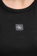 Top bianco Calvin Klein Jeans in maglia a costine con logo