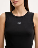 Top bianco Calvin Klein Jeans in maglia a costine con logo